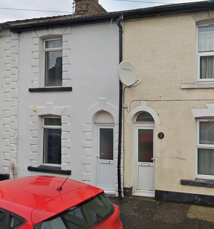Terraced property with tidy frontage and on-str...