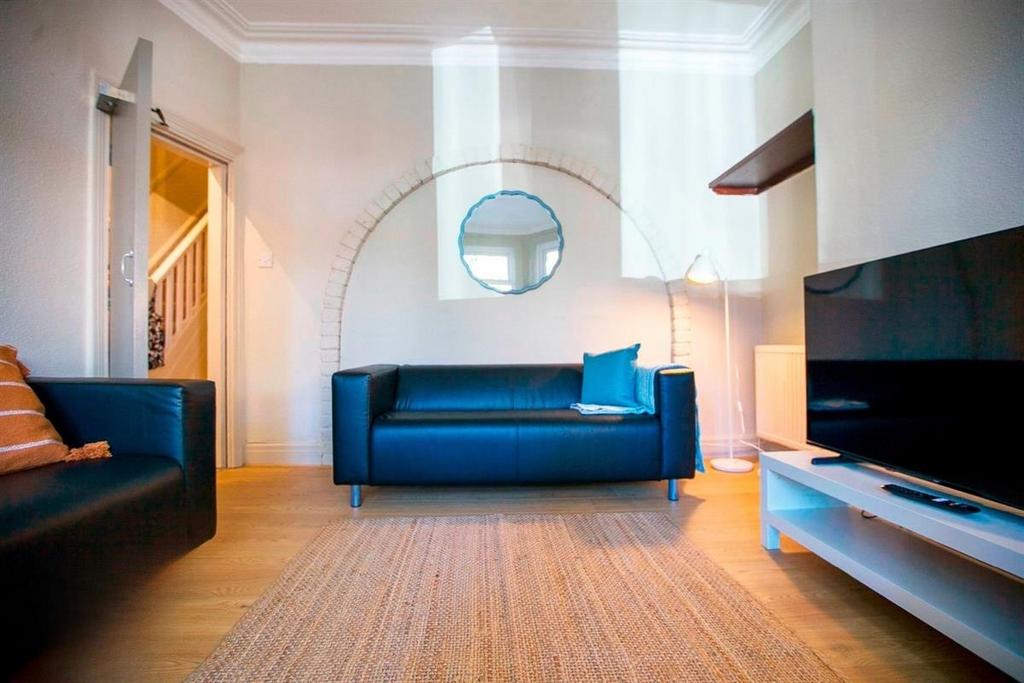 Bright modern living room with stylish sofas...