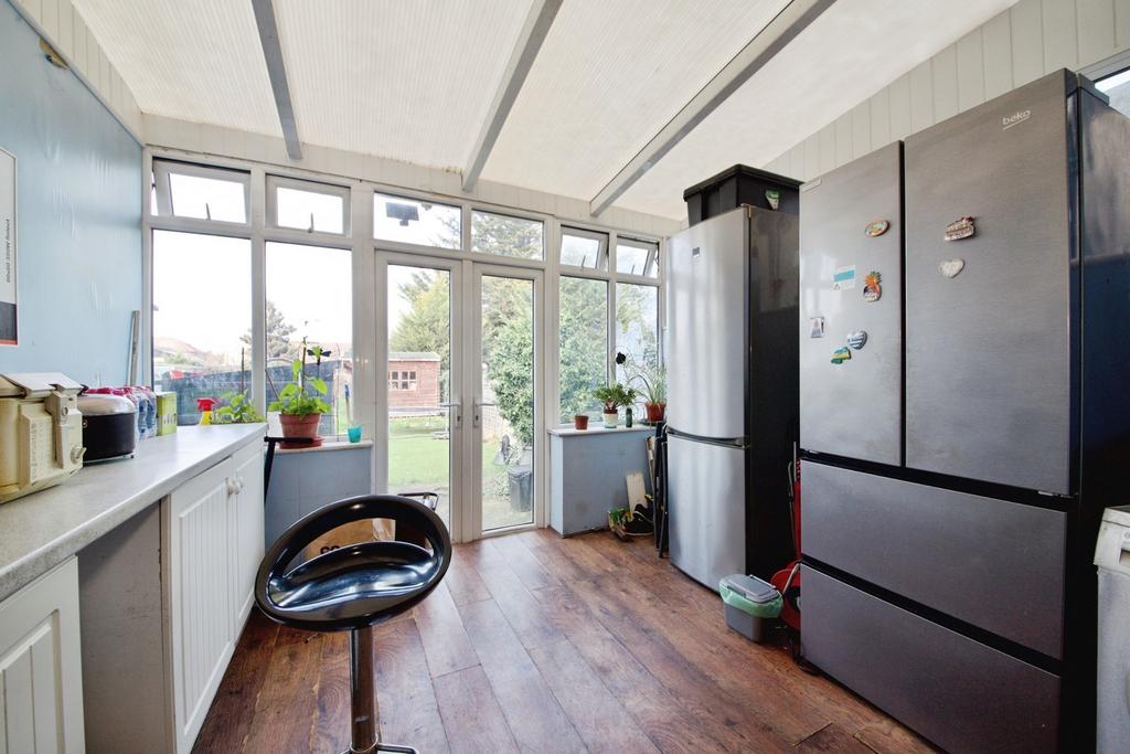 Conservatory interior, conservatory, french doors leading to garden