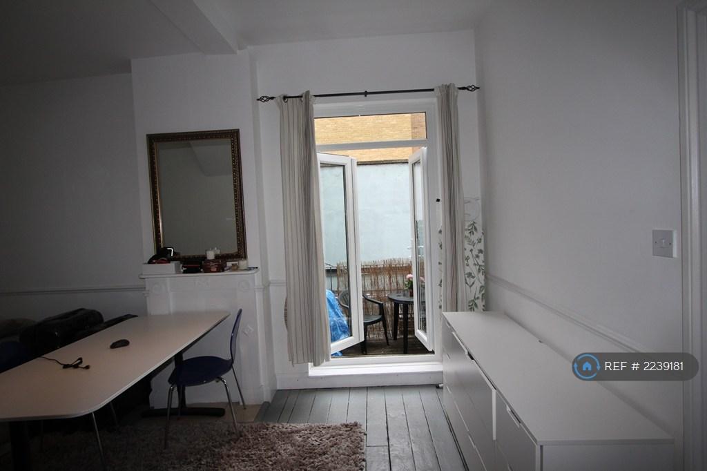 Lounge/Doors To Roof Terrace