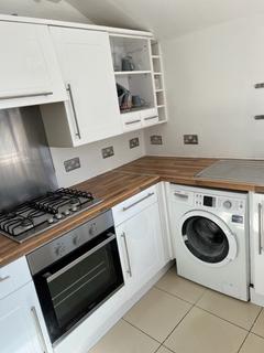 3 bedroom terraced house to rent, Grove Road, London SW19