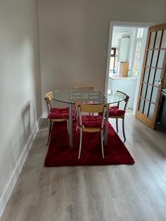 3 bedroom terraced house to rent, Grove Road, London SW19