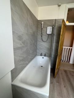 3 bedroom terraced house to rent, Grove Road, London SW19
