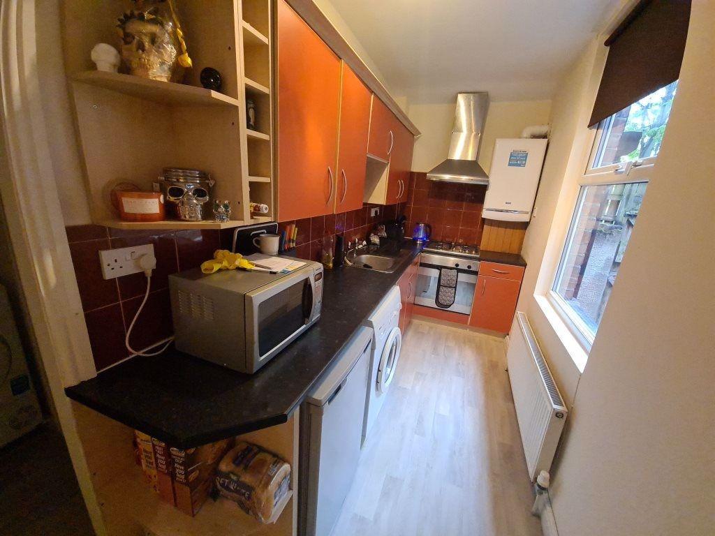 Neat galley kitchen with modern units...