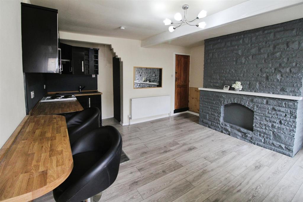 Living room/ kitchen area