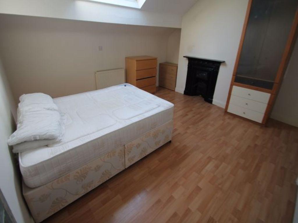 Bright room with double bed and skylight...