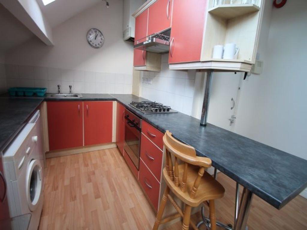 Modern galley kitchen with breakfast bar...
