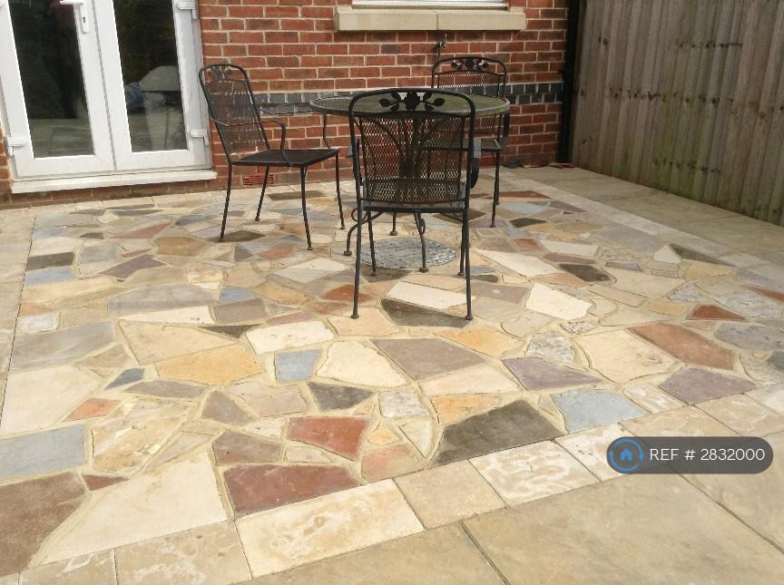 Bespoke Patio With Seating And Barbecue Area