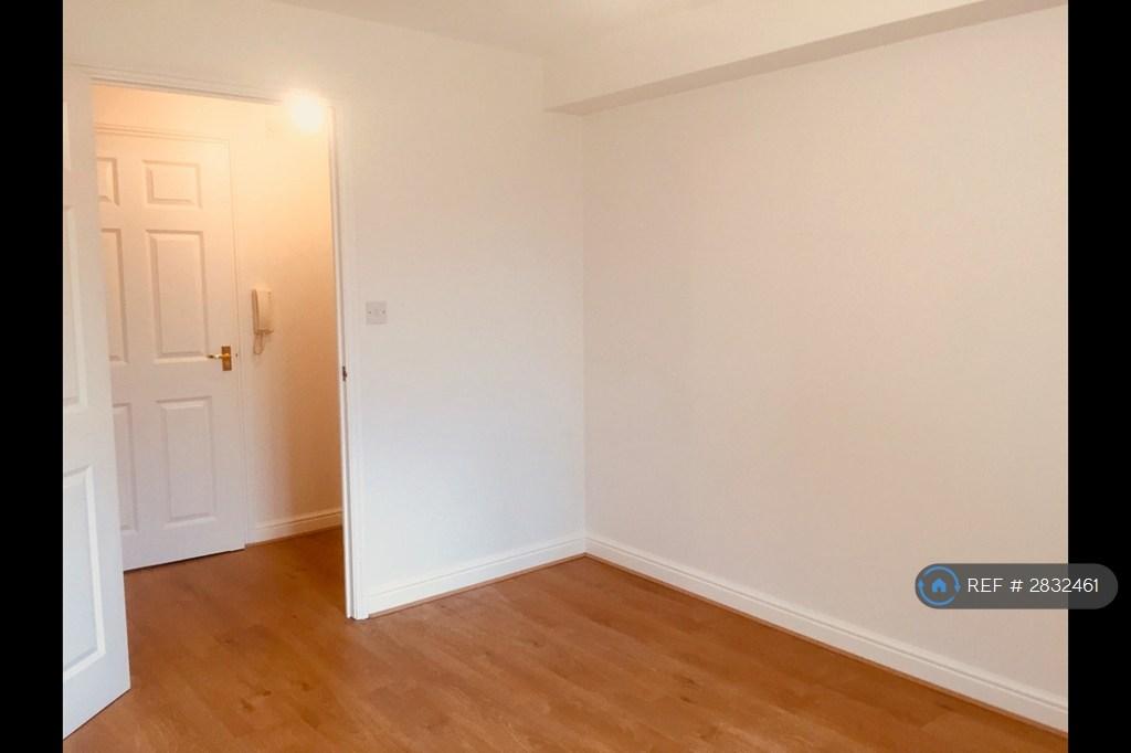 Bedroom With Wood Floors