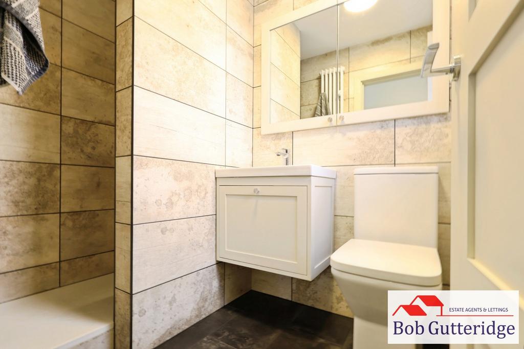 Luxury fully tiled bathroom