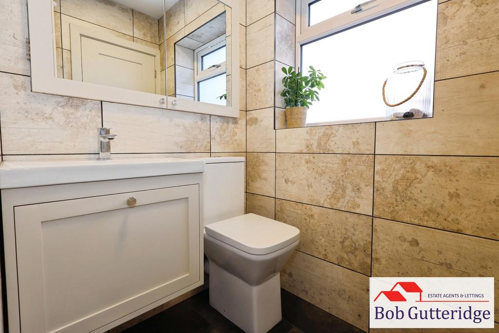 Luxury fully tiled bathroom