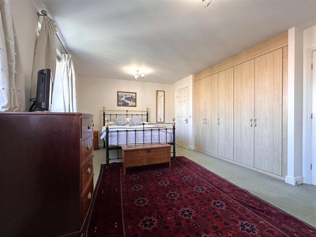 Master Bedroom With Extensive Fitted Wardrobes 702