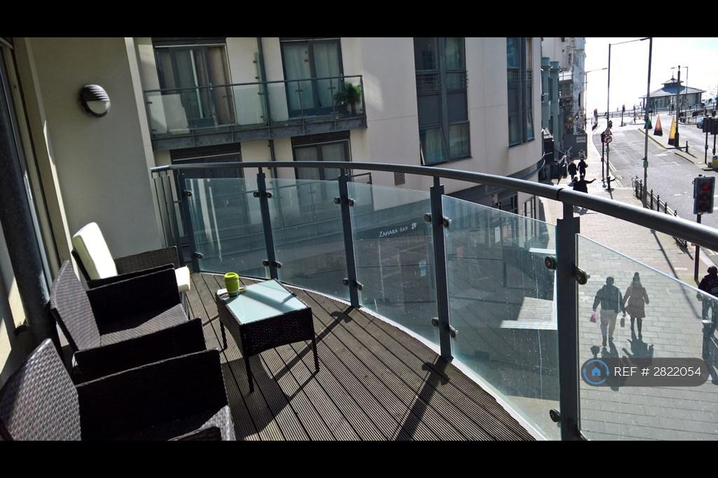 Balcony With Wooden Decking And Easy Care Seating
