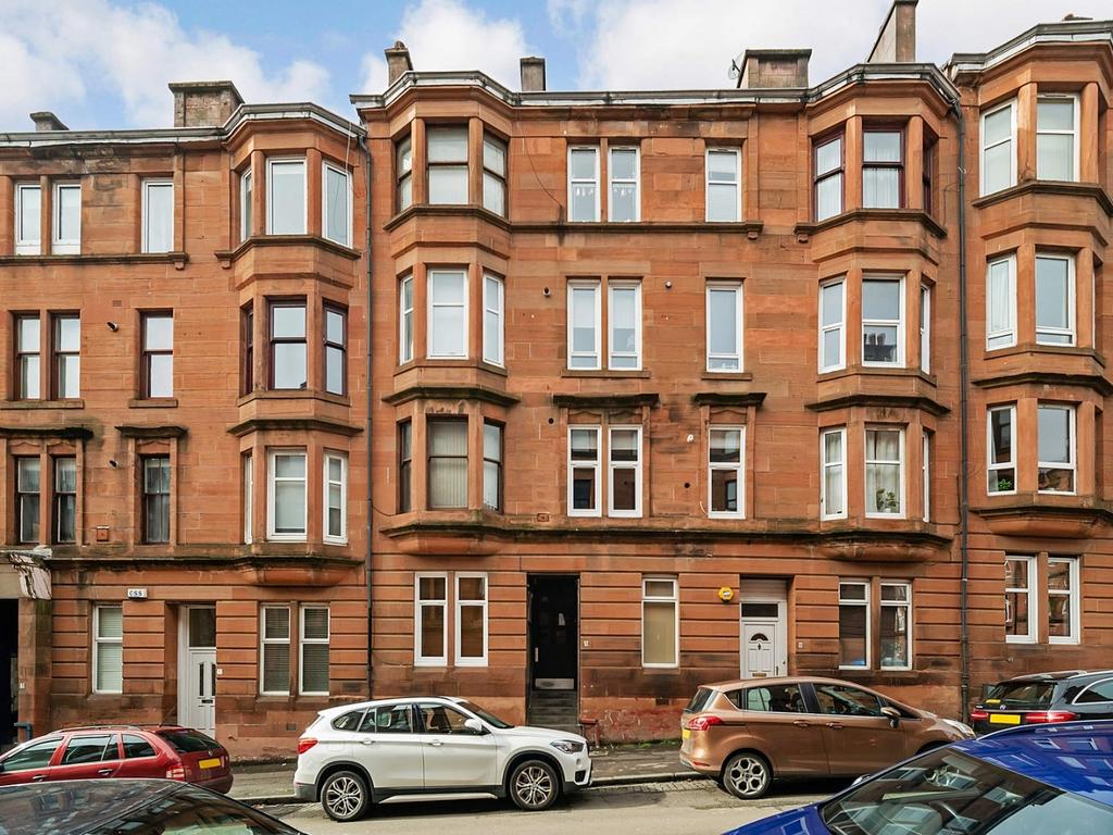 Attractive red-brick Victorian tenement frontag...