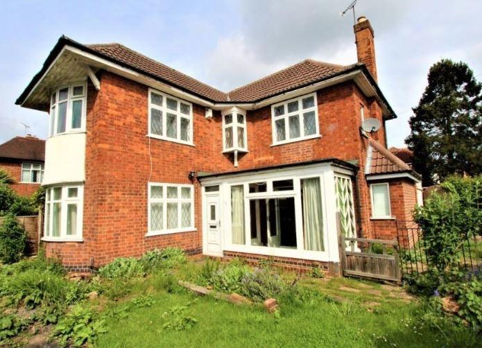 Charming brick house with garden and bay window...