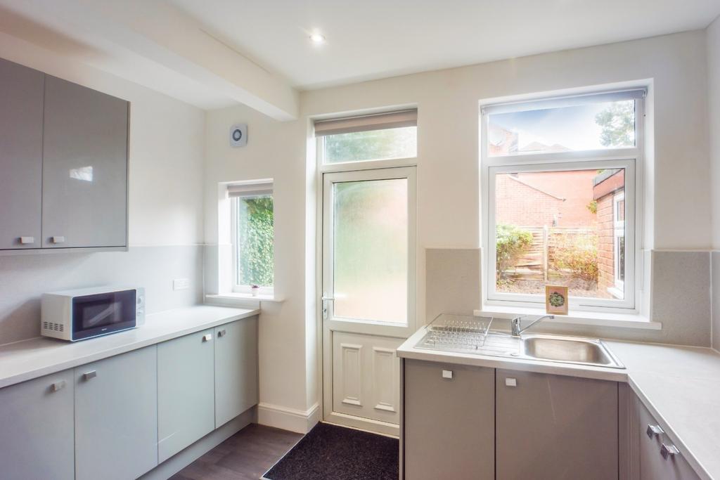 Bright modern kitchen with ample storage...