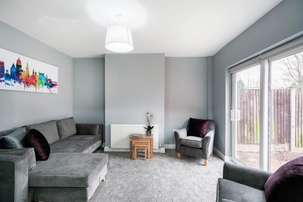 Bright modern lounge with comfy seating...