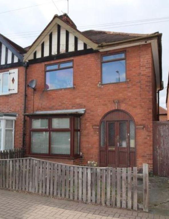 Redbrick semi with bay window and small front y...