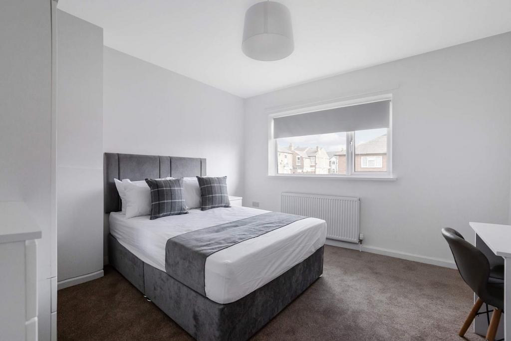 Bright, tidy bedroom with modern double bed...