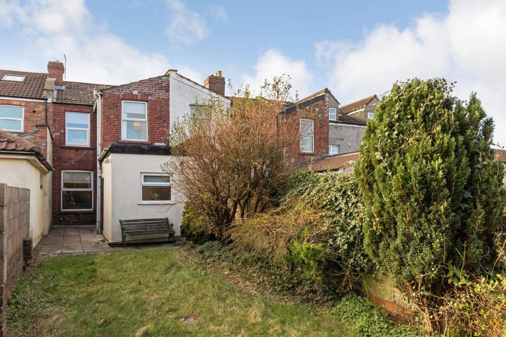 Private rear garden with lawn and mature shrubs...