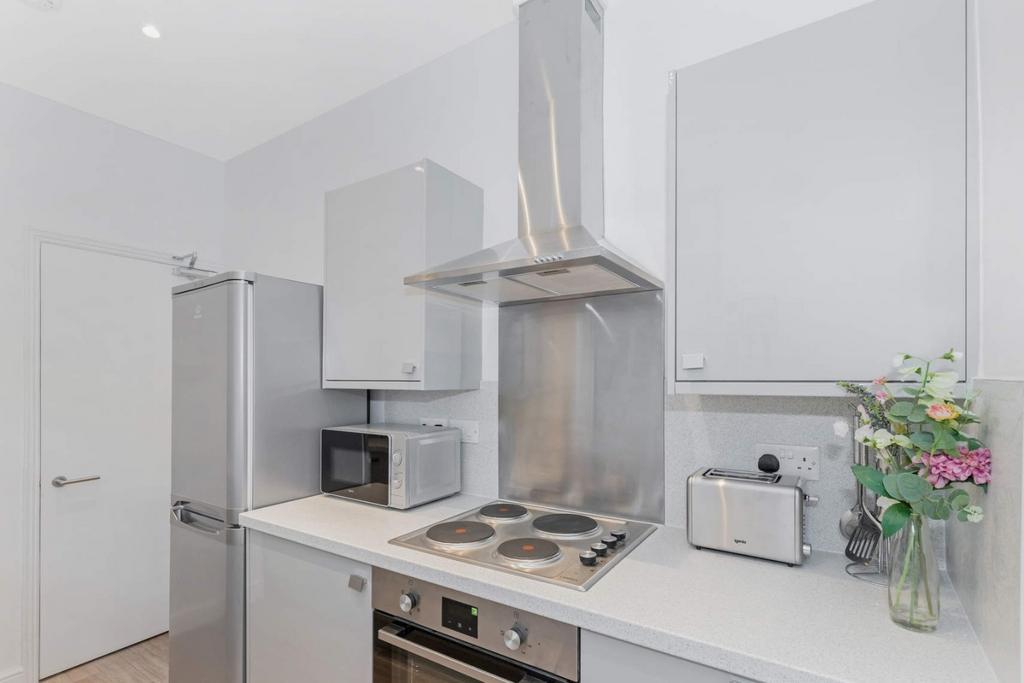 Bright modern kitchen with appliances...