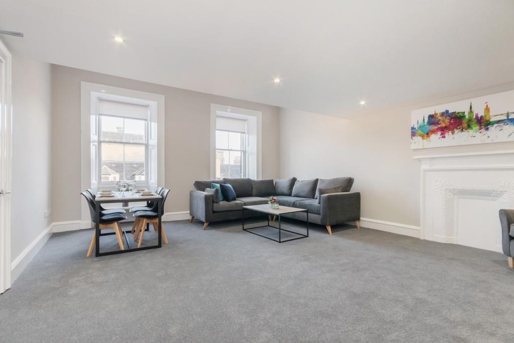 Bright, spacious lounge with modern seating...