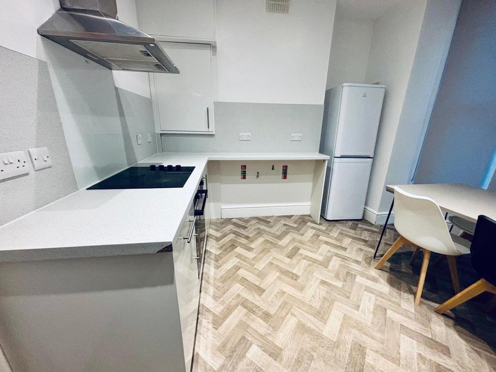 Modern fitted kitchen with dining spot...