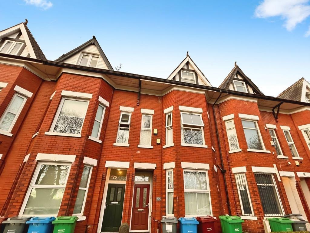Attractive red-brick terraced house frontage...