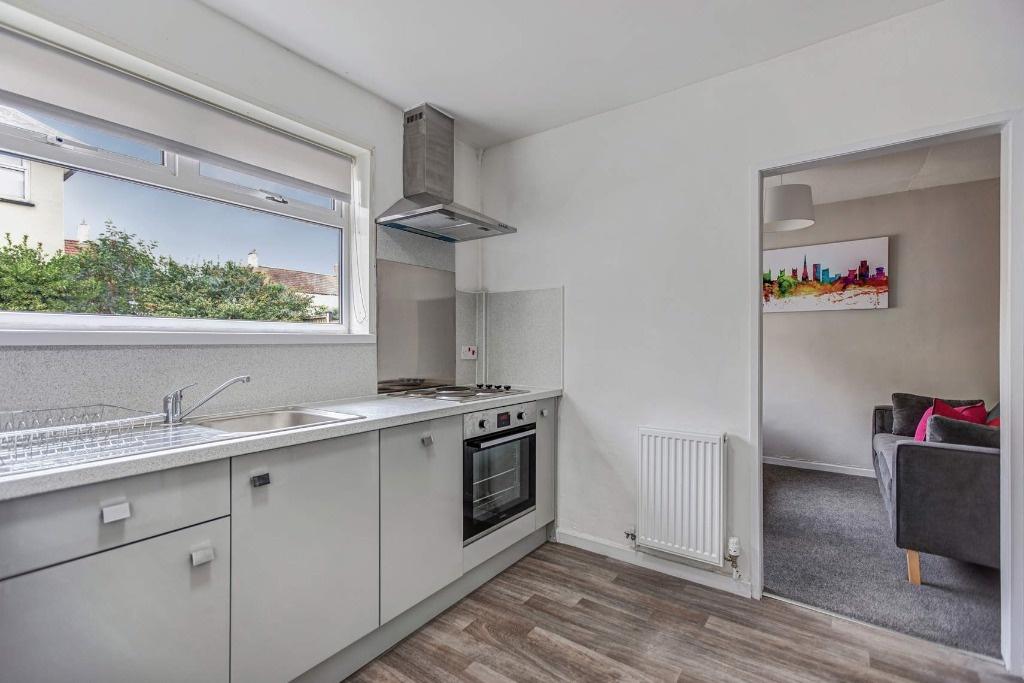 Bright modern kitchen with fitted appliances...