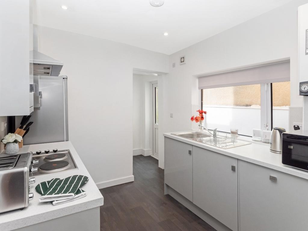 Bright modern kitchen with sleek cabinets...