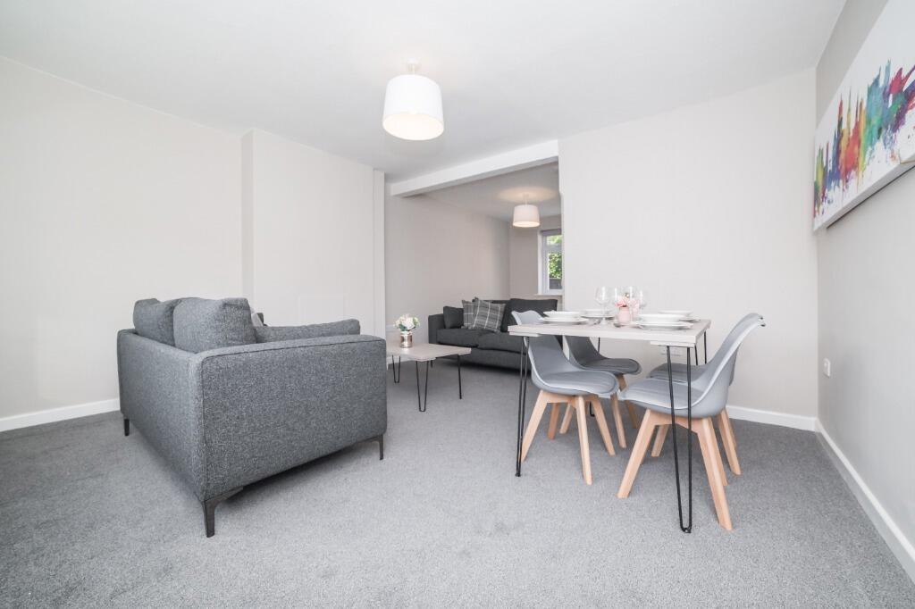 Bright modern lounge with dining area...