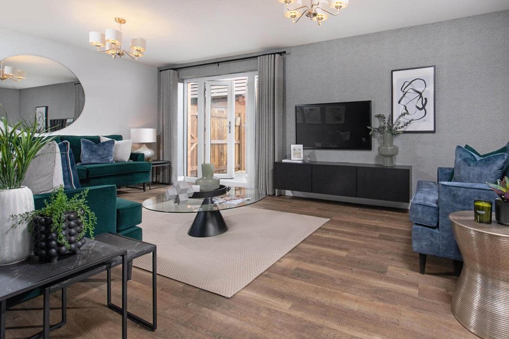 French doors lead from the living room to the...