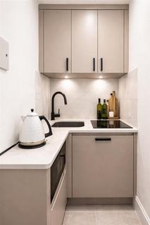 Studio to rent, Great Titchfield Street, London W1W