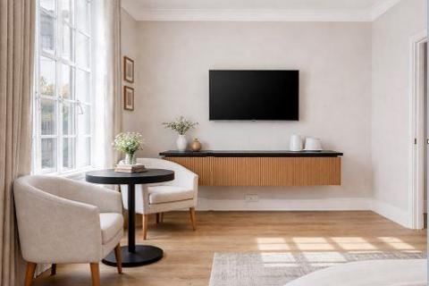 Studio to rent, Great Titchfield Street, London W1W