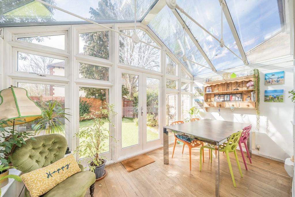 Conservatory interior, conservatory, french doors leading to garden