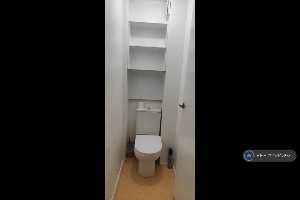 The Toilet To Share For The First Bedroom