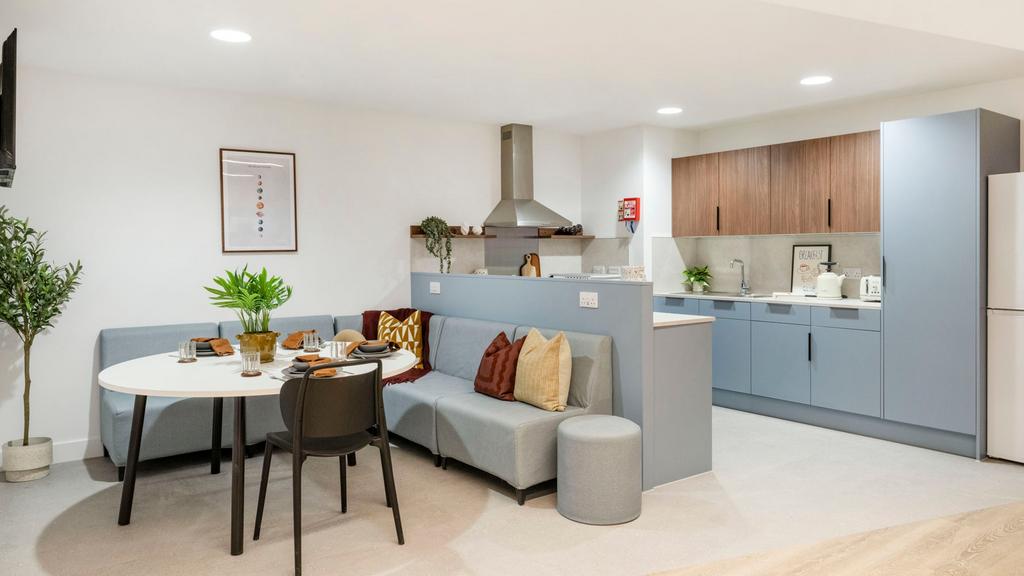 Bright, modern open-plan kitchen and dining are...