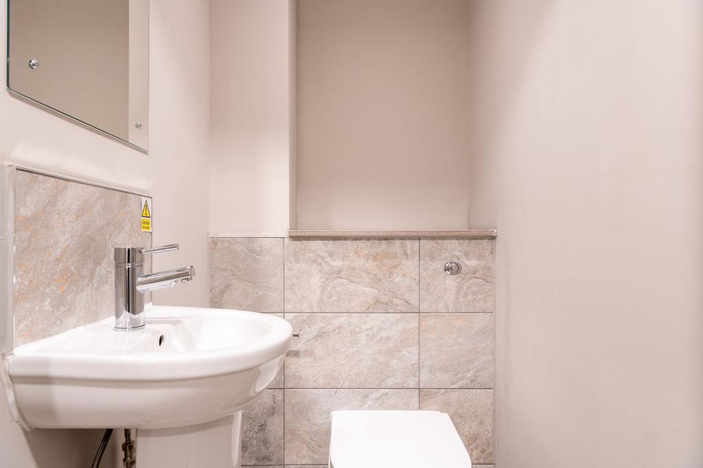 Bright, well-maintained WC with modern basin, c...