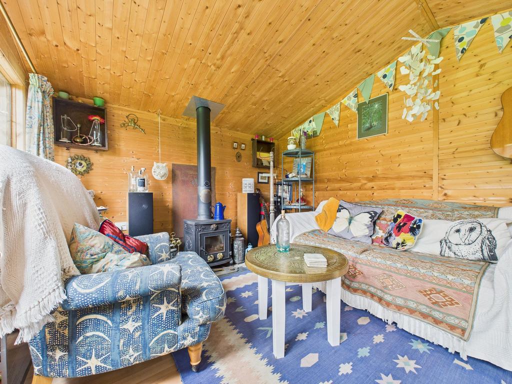 Wooden Outbuilding with Log Burner
