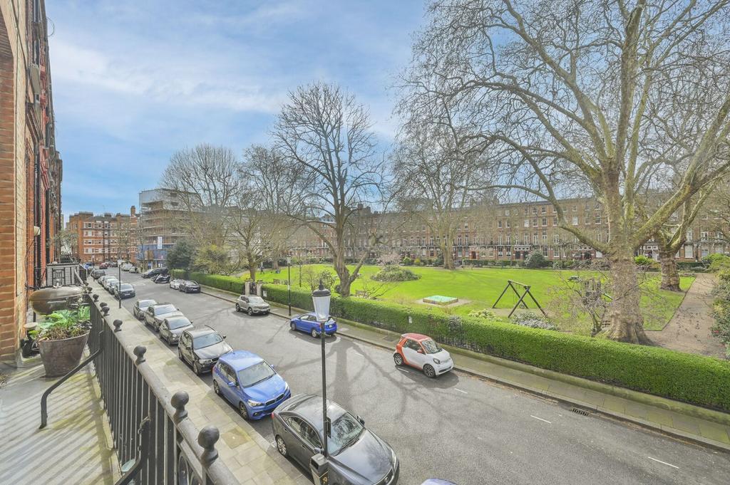 Street scene with property, garden