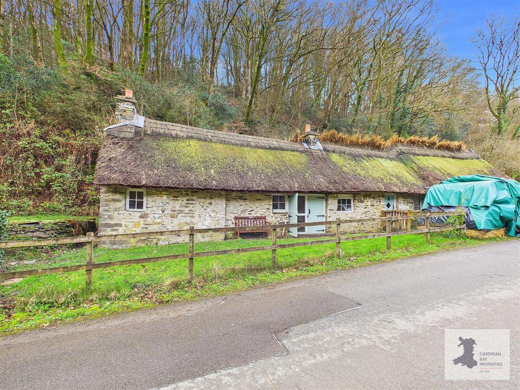 Thatched outbuildings