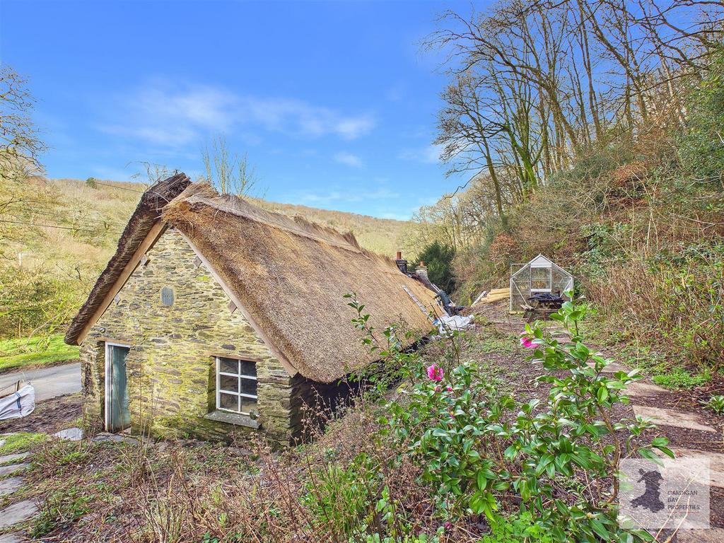 Thatched outbuildings