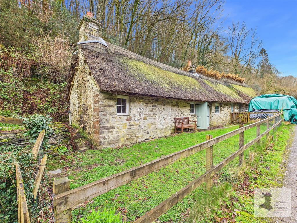 Thatched outbuildings