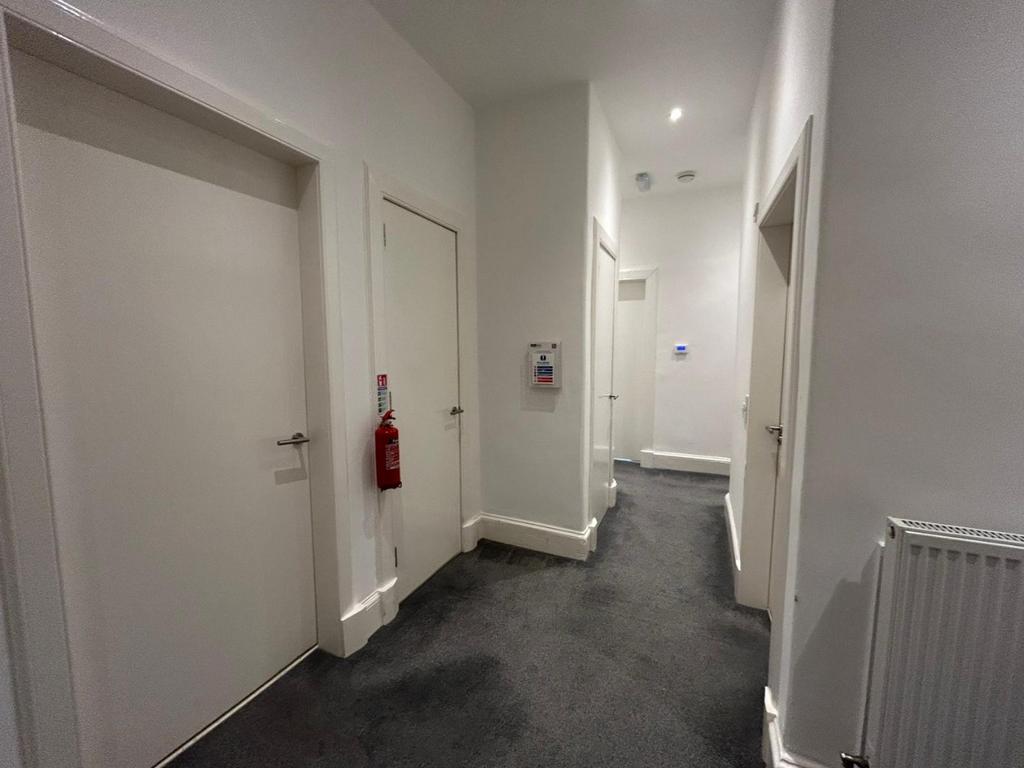 Bright clean communal hallway with modern finis...