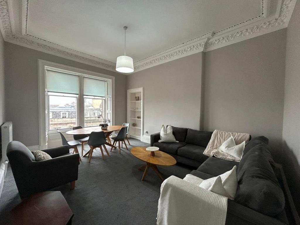 Bright modern lounge with dining area...