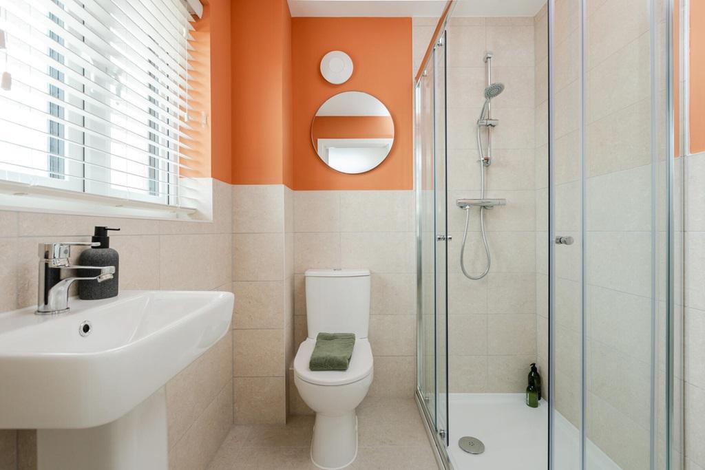Bedroom 1 also hosts a private en suite shower...