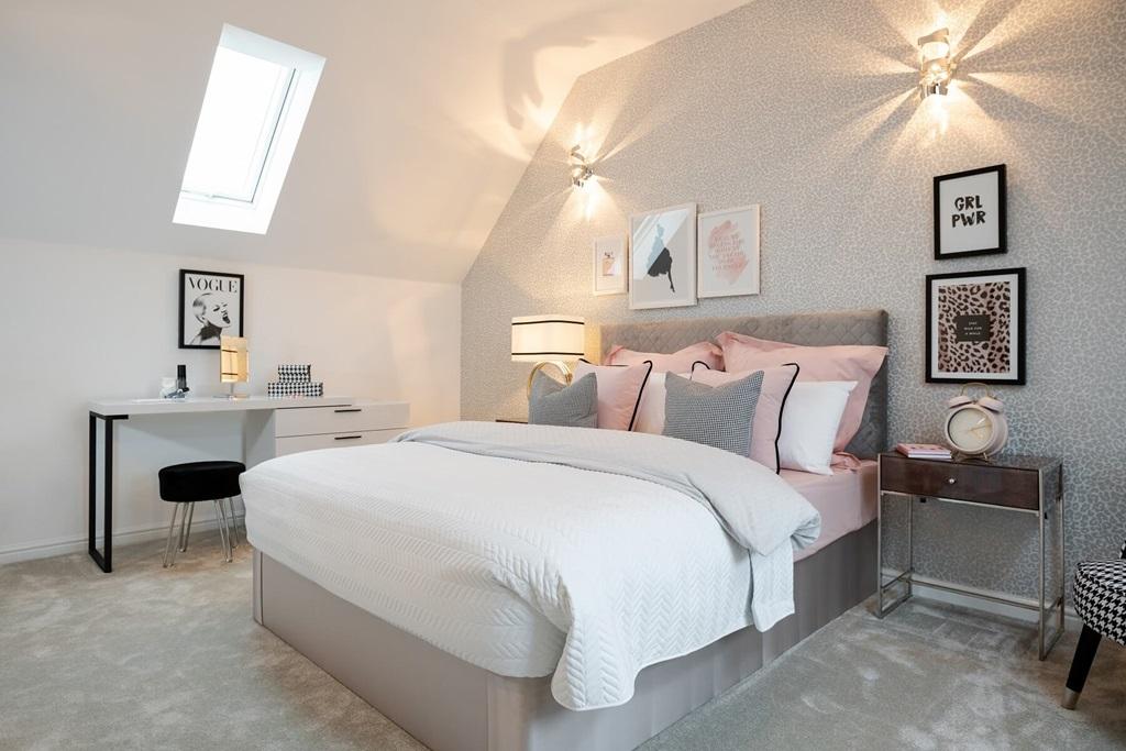 Bedroom 2 welcomes plenty of natural light
