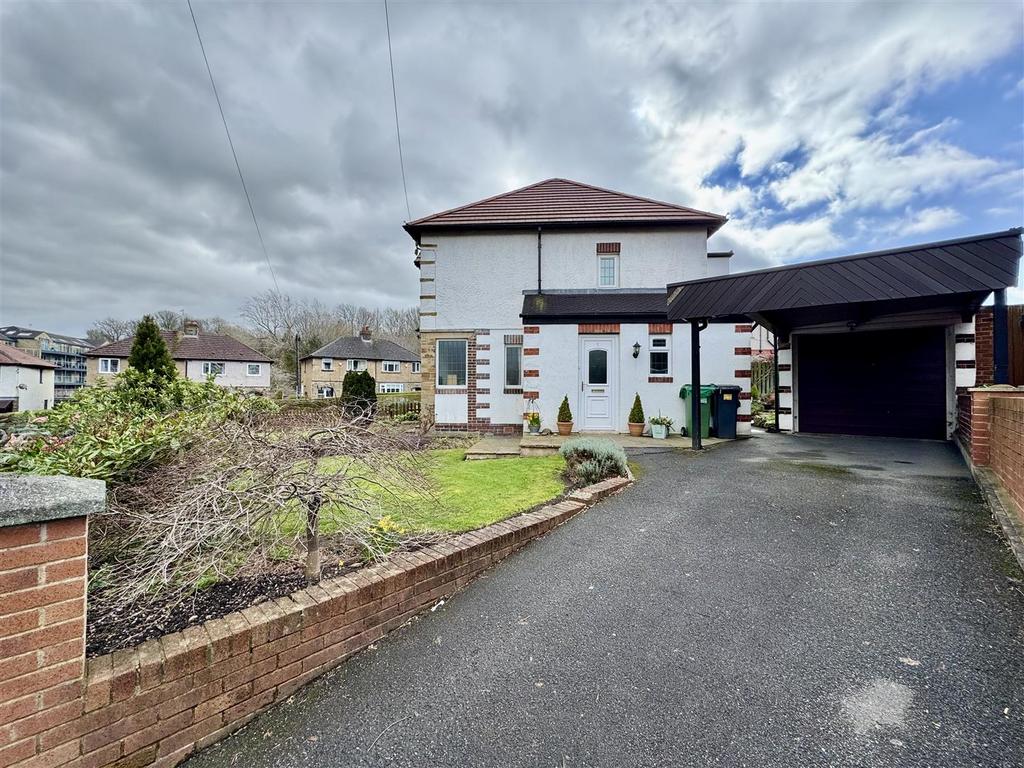 External front, garage and driveway