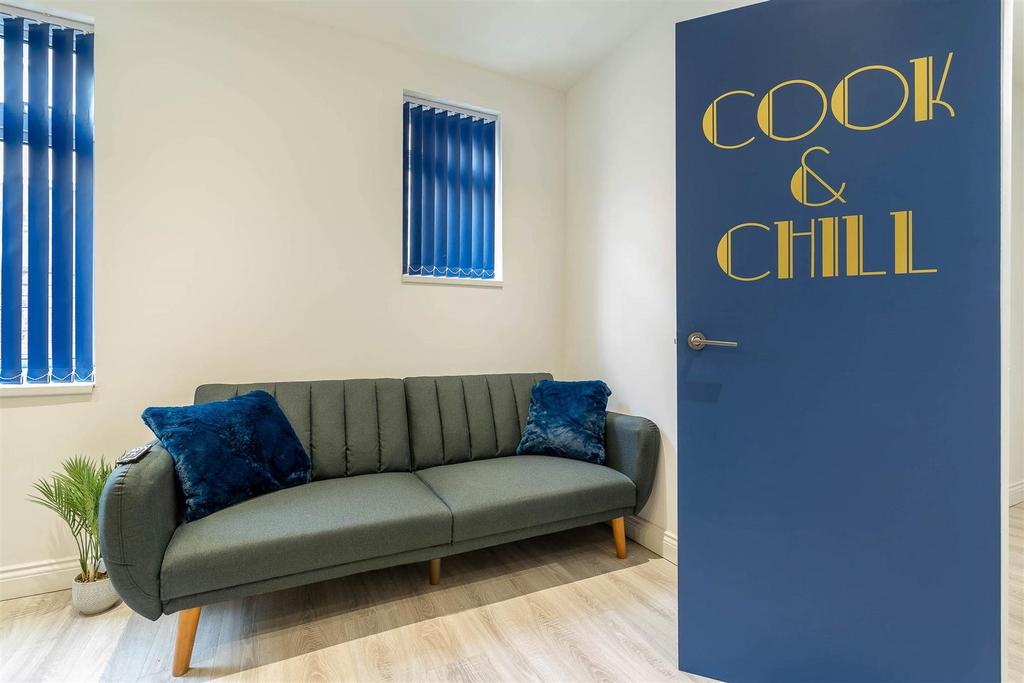 Stylish lounge with modern sofa and bright deco...