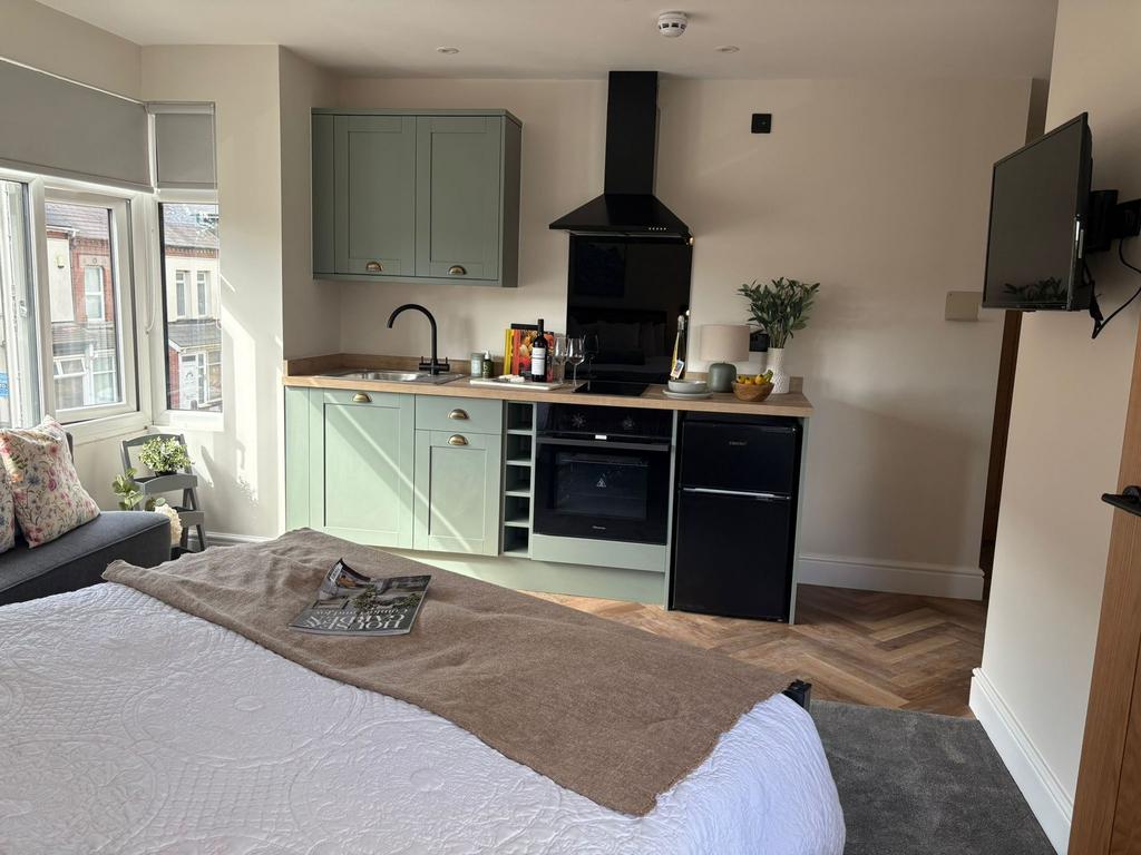 Bright, modern studio space with a comfortable ...